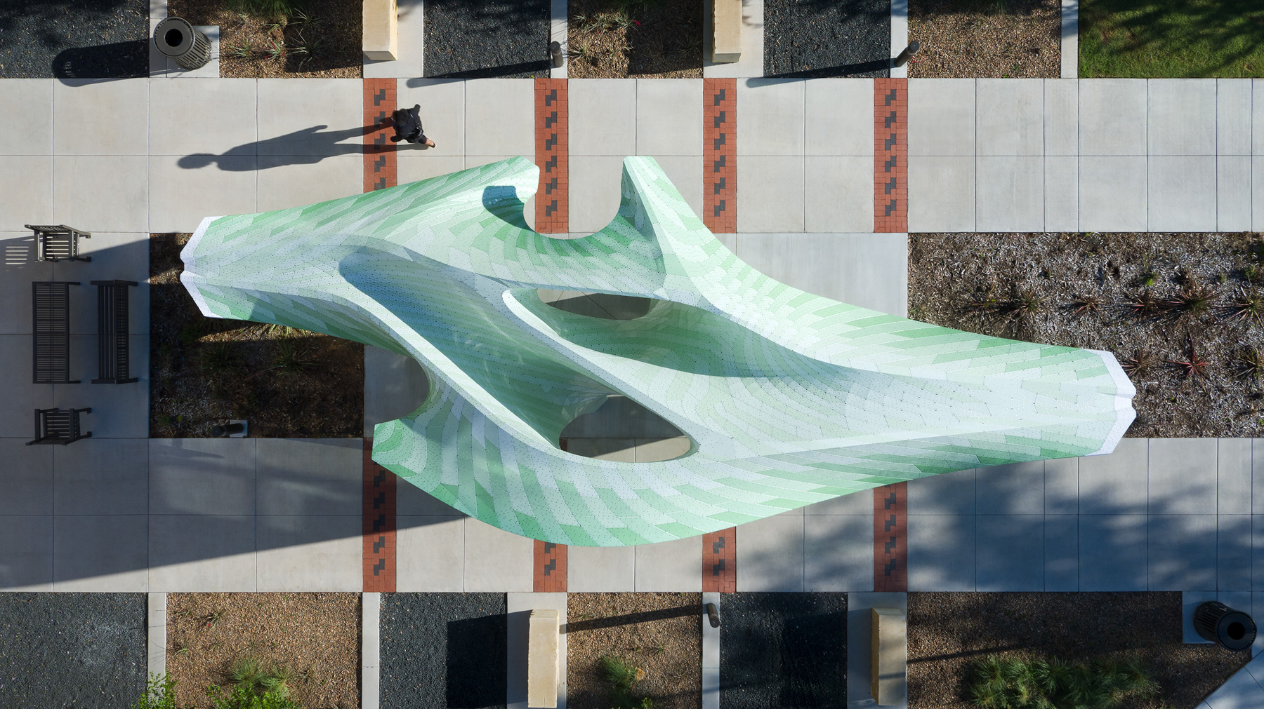 Large green geometric public art sculpture